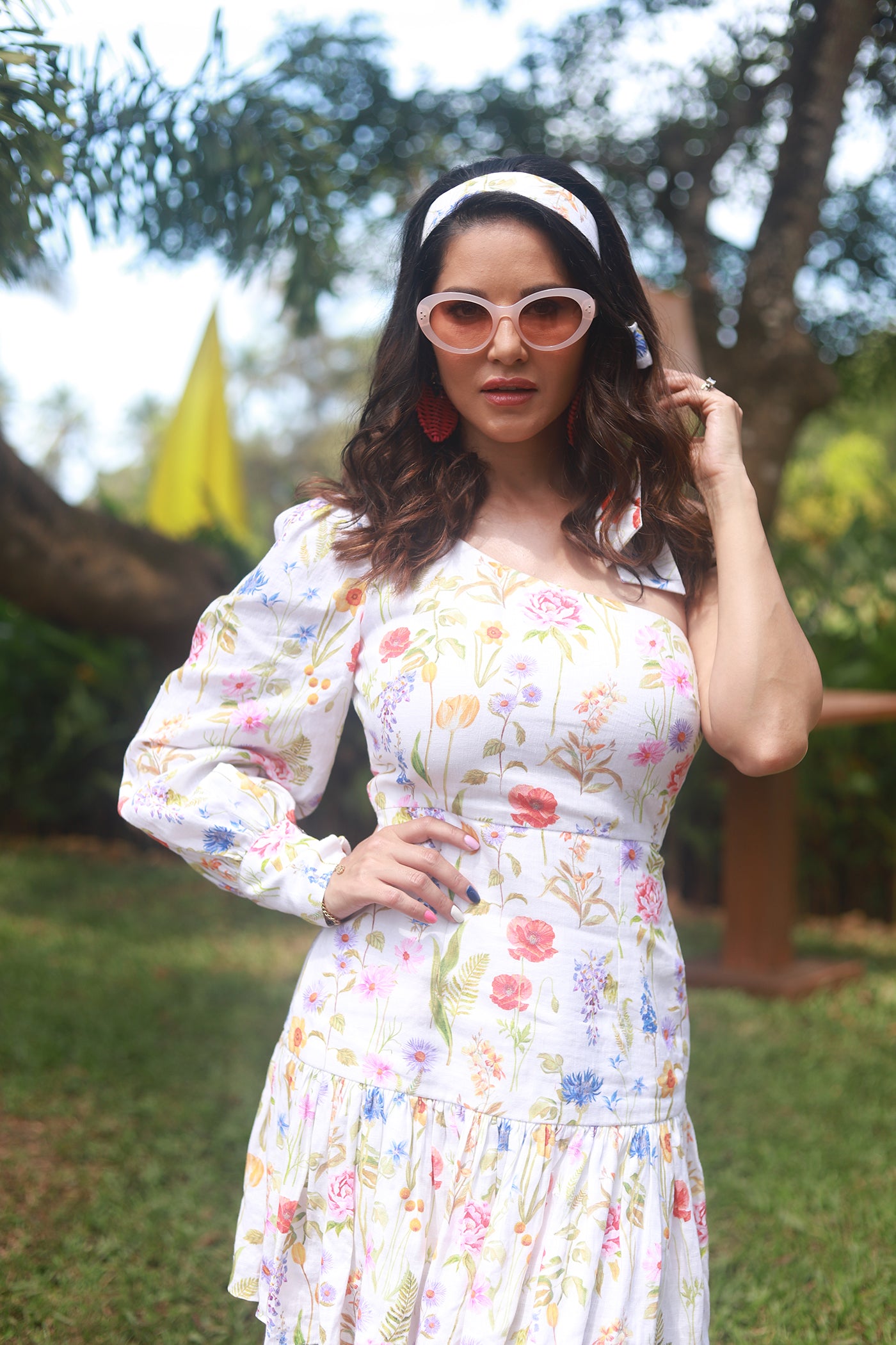 SUNNY LEONE IN DAINTY DAISIES ONE SHOULDER DRESS
